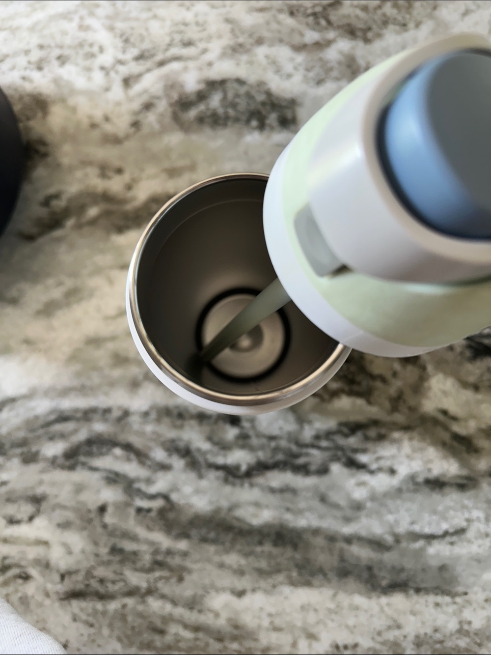 Owala Stainless Water Bottle in White with Pale Green and Slate Lid - Picture 2 of 4